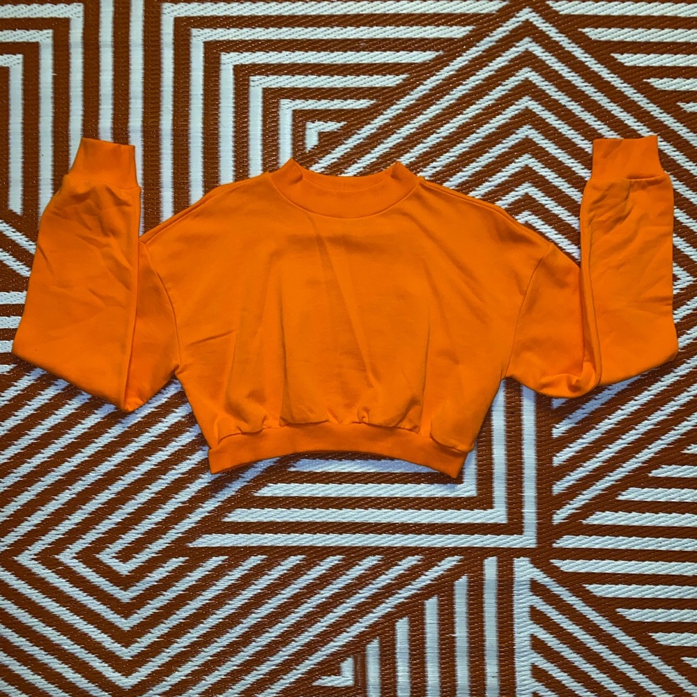 Orange crop sweater